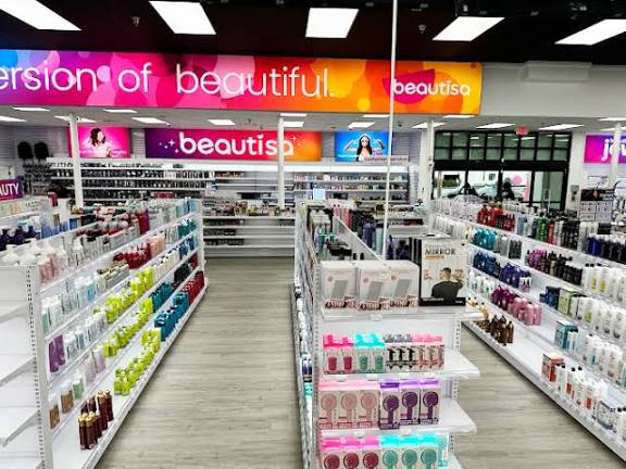 Beauty products lining the shelves along the store aisles